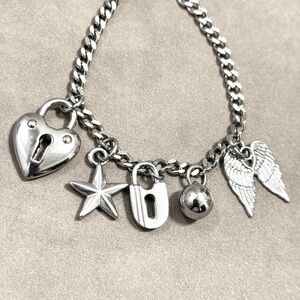 Steel Charm Bracelet with Heart and Wing Charms